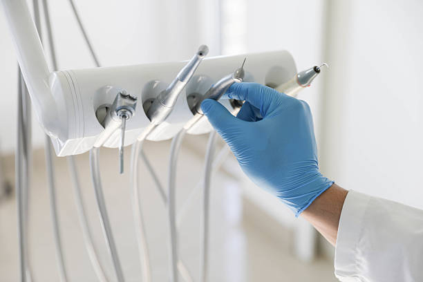 Professional Tooth Extraction technician working in Clio, MI